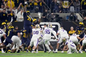 Michigan Completes Undefeated Season With 34 13 College Football Playoff Championship Game Victory Over Washington