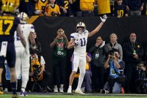 Michigan Completes Undefeated Season With 34 13 College Football Playoff Championship Game Victory Over Washington