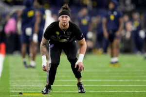 Michigan Completes Undefeated Season With 34 13 College Football Playoff Championship Game Victory Over Washington