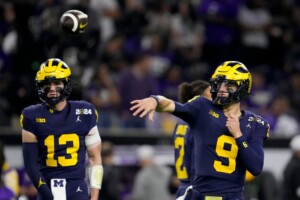 Michigan Completes Undefeated Season With 34 13 College Football Playoff Championship Game Victory Over Washington