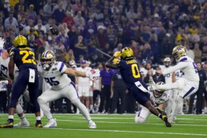 Michigan Completes Undefeated Season With 34 13 College Football Playoff Championship Game Victory Over Washington