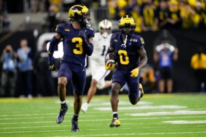 Michigan Completes Undefeated Season With 34 13 College Football Playoff Championship Game Victory Over Washington
