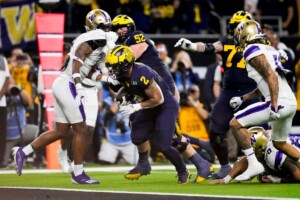 Michigan Completes Undefeated Season With 34 13 College Football Playoff Championship Game Victory Over Washington
