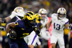 Michigan Completes Undefeated Season With 34 13 College Football Playoff Championship Game Victory Over Washington