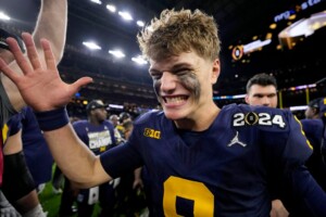 Michigan Completes Undefeated Season With 34 13 College Football Playoff Championship Game Victory Over Washington