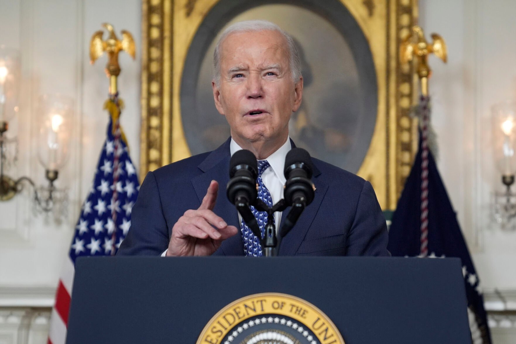 <p>President Joe Biden speaks Thursday evening in the Diplomatic Reception Room of the White House.</p>