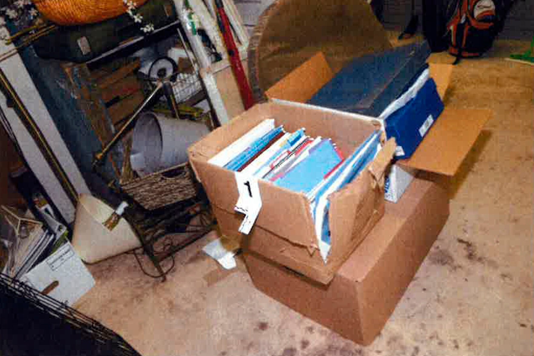 <p>This image, contained in the report from special counsel Robert Hur, and marked with the number 1, shows a damaged box where classified documents were found in the garage of President Joe Biden in Wilmington, Del., during a search by the FBI on Dec. 21, 2022.  </p>