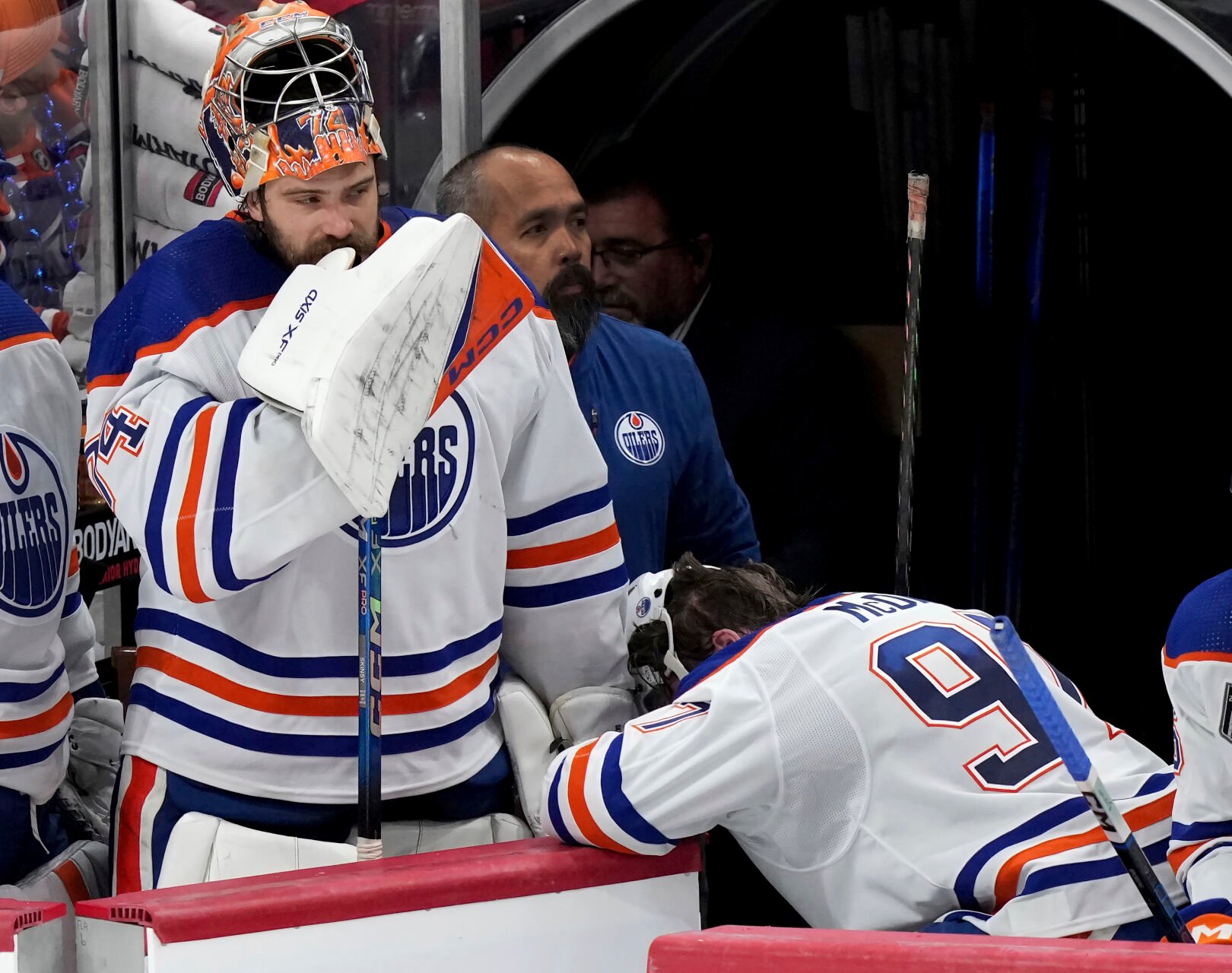 <p>Edmonton Oilers goaltender Stuart Skinner, left, and forward Connor McDavid react after losing to the Florida Panthers in Game 7 of the Stanley Cup Final on Monday in Sunrise, Fla.</p>