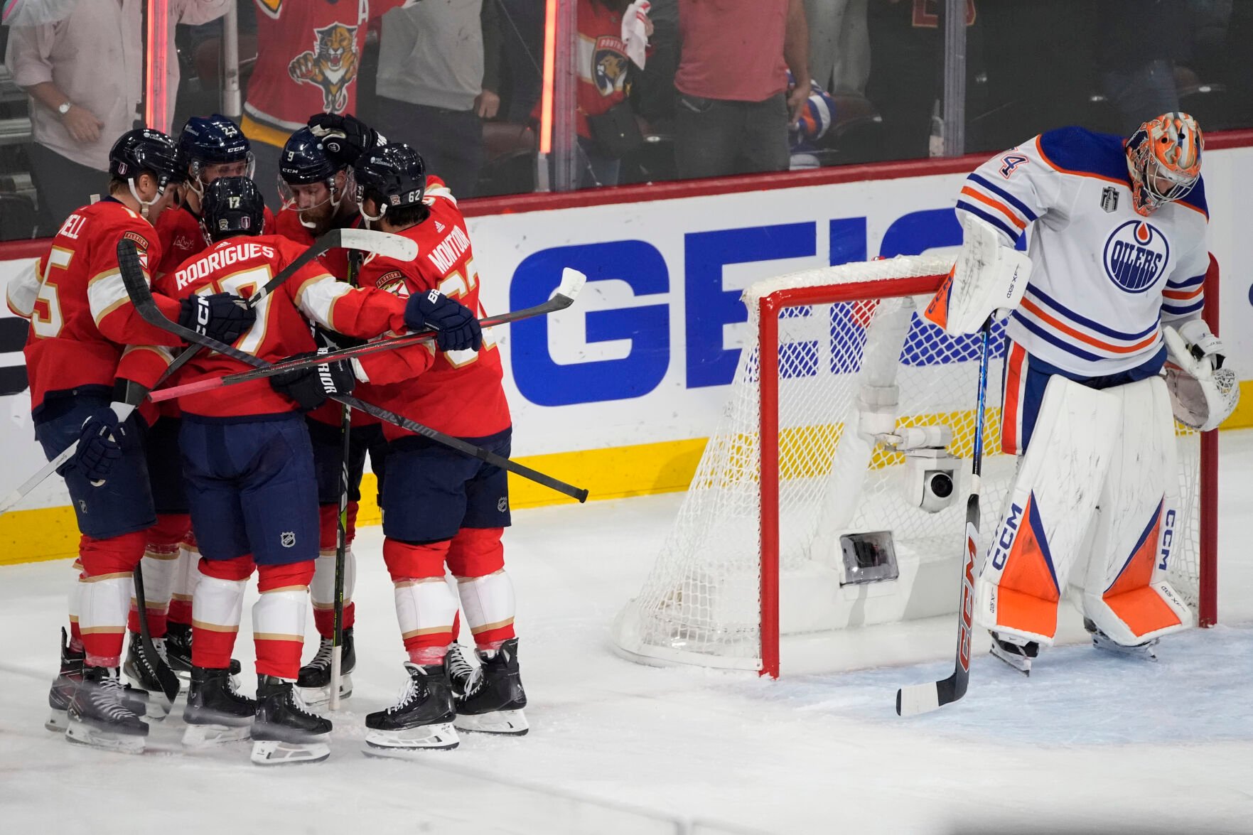 <p>Florida Panthers teammates celebrate with Carter Verhaeghe (23) after he scored a goal during Game 7 of the Stanley Cup Final against the Edmonton Oilers on Monday in Sunrise, Fla.</p>