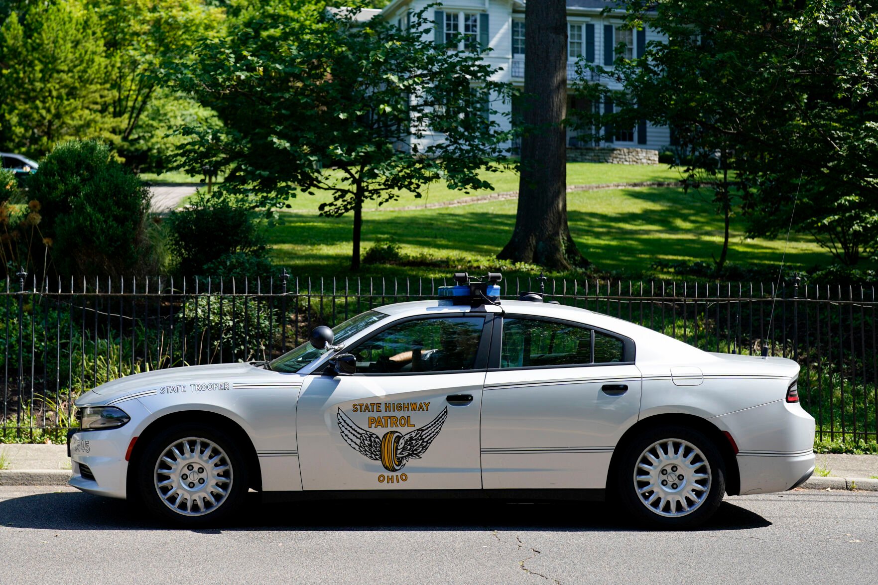 <p>Security vehicles are parked outside the home of Ohio Sen. JD Vance, who is on Donald Trump's vice presidential short list, on Monday in Cincinnati.</p>