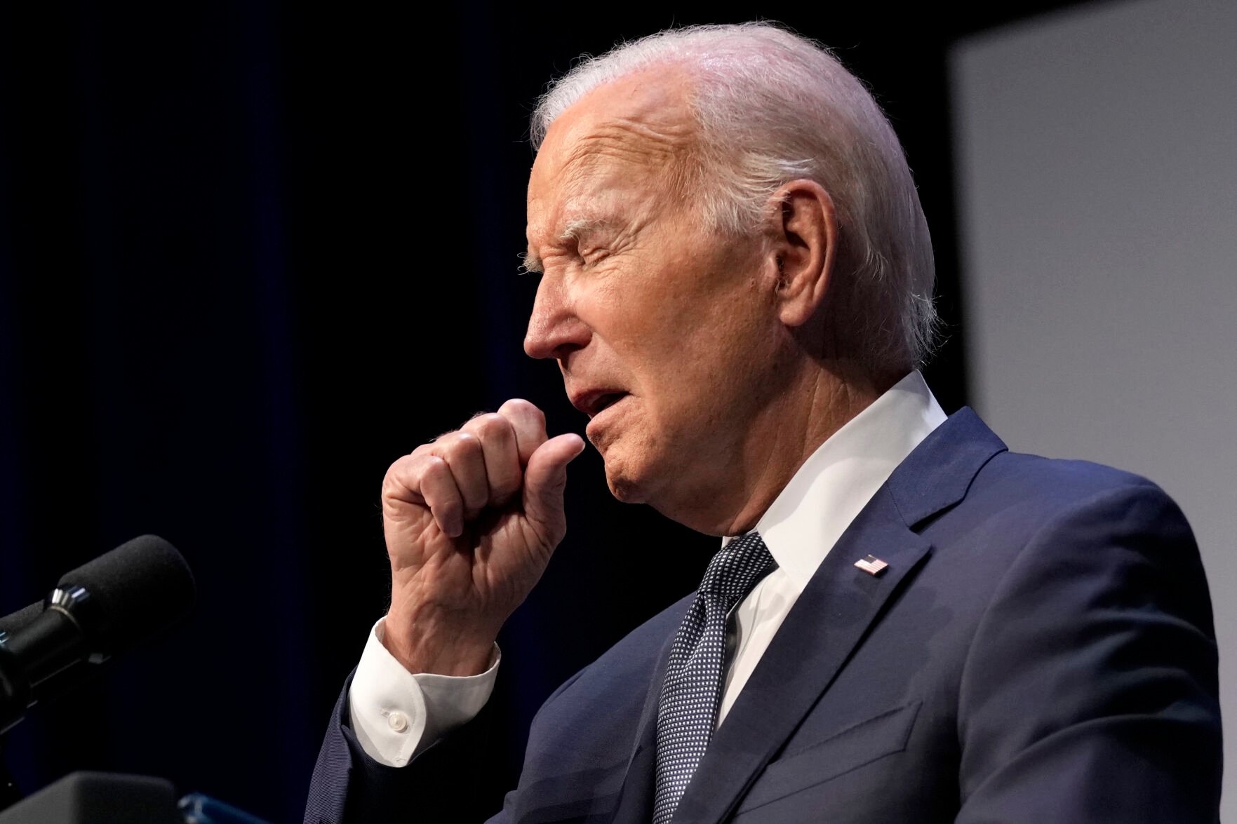 <p>President Joe Biden coughs Tuesday during an event with Rep. Steven Horsford, D-Nev., in Las Vegas. Biden tested positive for COVID-19.</p>