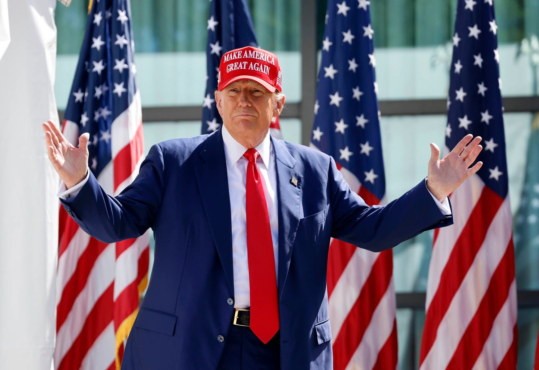 <p>Republican presidential candidate and former President Donald Trump enters at a campaign event June 18 in Racine, Wis.  </p>