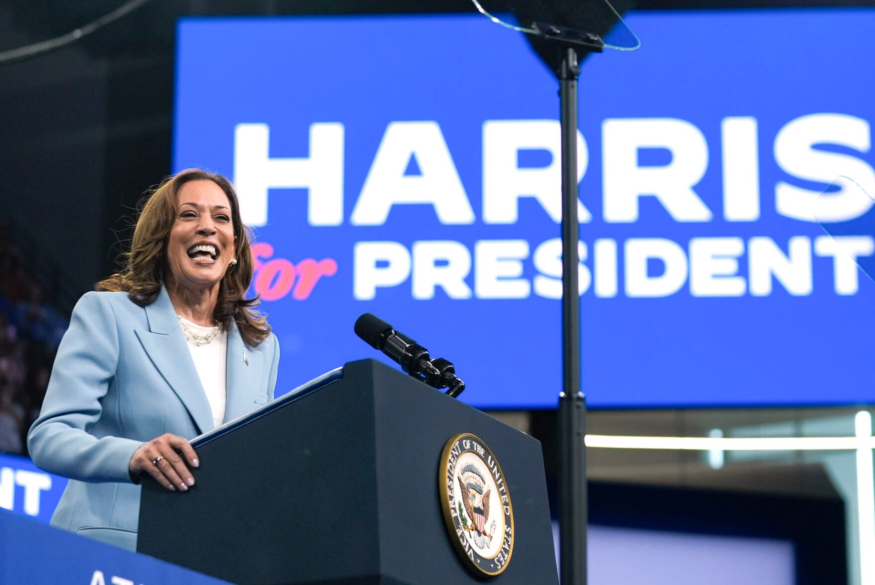 <p>FILE - Vice President Kamala Harris speaks during a campaign rally, July 30, 2024, in Atlanta. Harris, the daughter of immigrants who rose through the California political and law enforcement ranks to become the first female vice president in U.S. history, is poised to secure the Democratic Party's presidential nomination Monday, Aug. 5, 2024. (AP Photo/John Bazemore, File)</p>