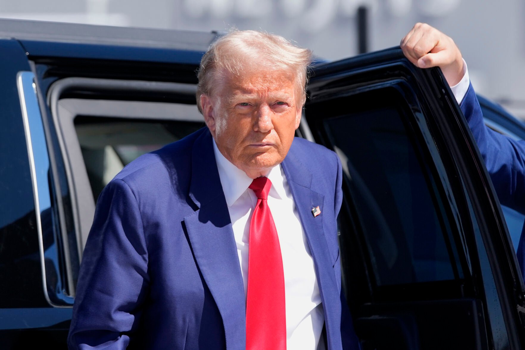 <p>Republican presidential nominee former President Donald Trump arrives at Harry Reid International Airport to board a plane after a campaign trip Saturday in Las Vegas. </p>