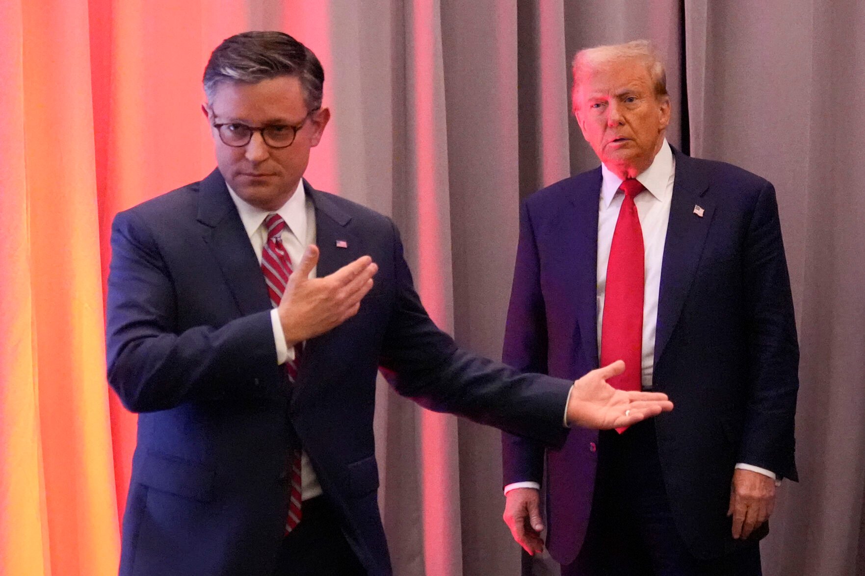 <p>President-elect Donald Trump, escorted by House Speaker Mike Johnson, R-La., arrives Wednesday for a meeting with the House GOP conference in Washington.</p>