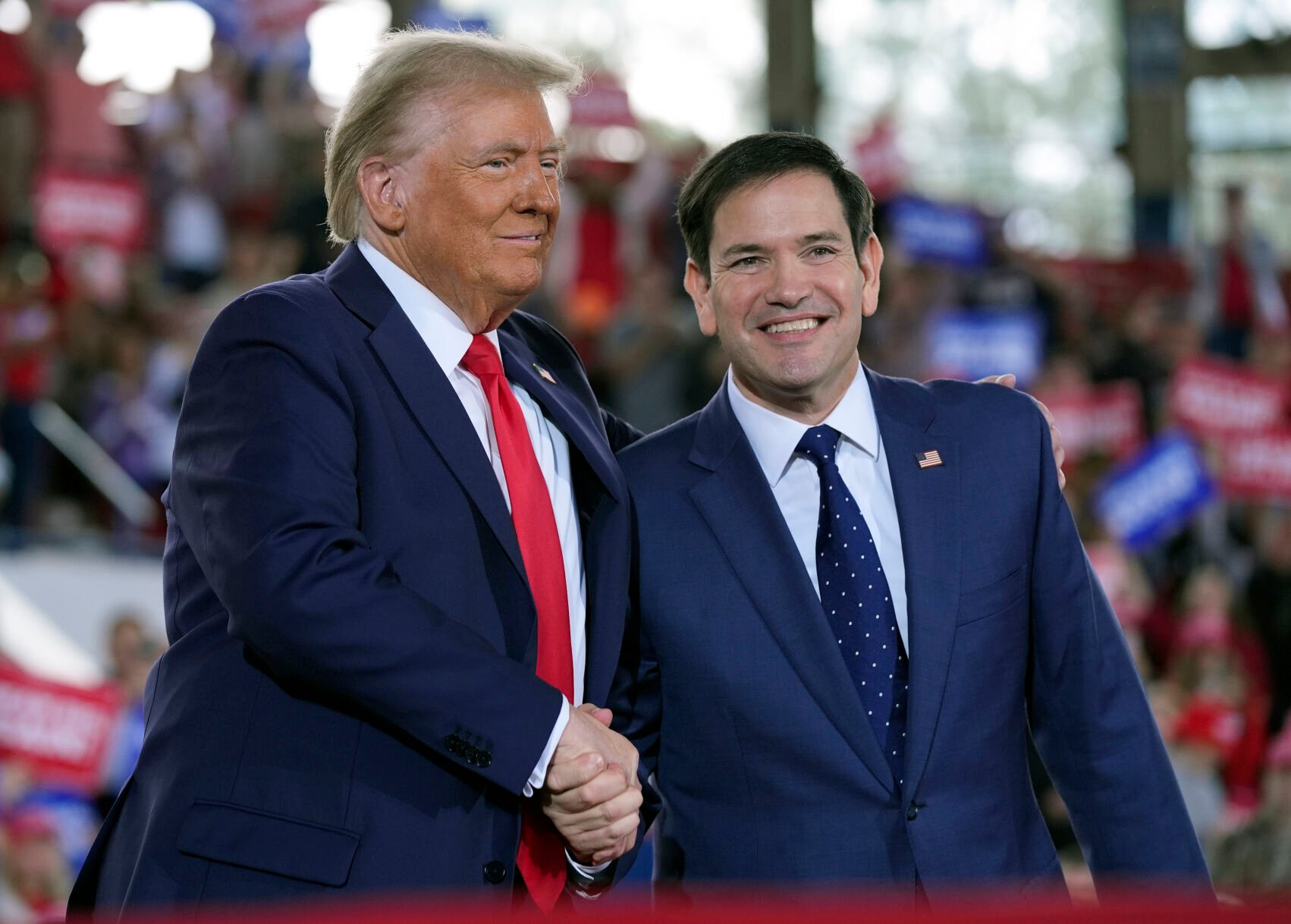 <p>FILE - Republican presidential nominee former President Donald Trump greets Sen. Marco Rubio, R-Fla., during a campaign rally at J.S. Dorton Arena, Nov. 4, 2024, in Raleigh, N.C. (AP Photo/Evan Vucci, File)</p>