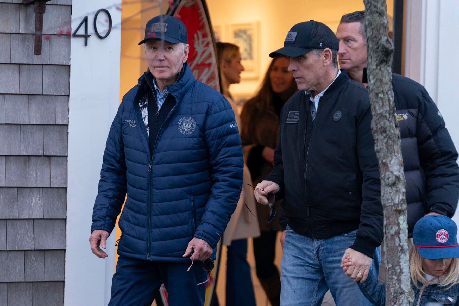 <p>President Joe Biden and son Hunter Biden walk on Nov. 29 in downtown Nantucket Mass.</p>
