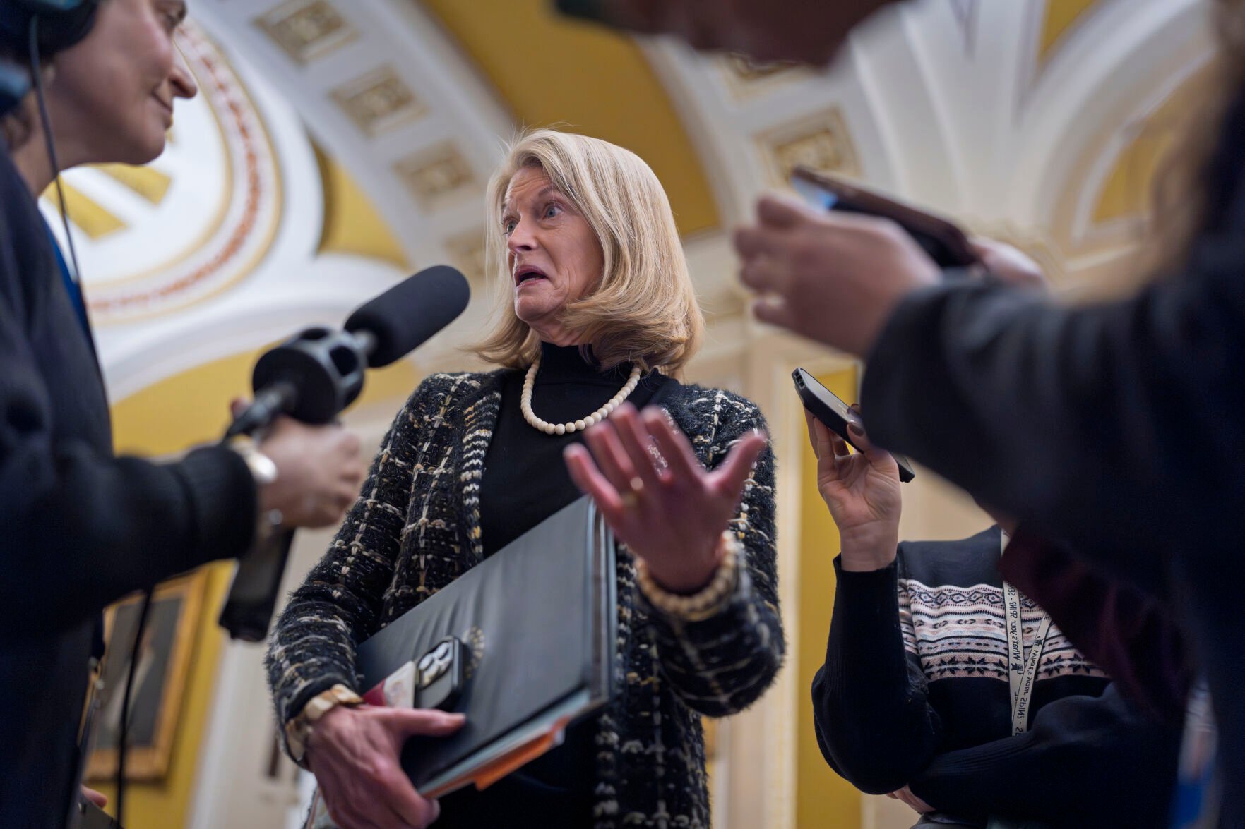 <p>Sen. Lisa Murkowski, R-Alaska, speaks with reporters Wednesday outside the Senate chamber at the Capitol in Washington.</p>