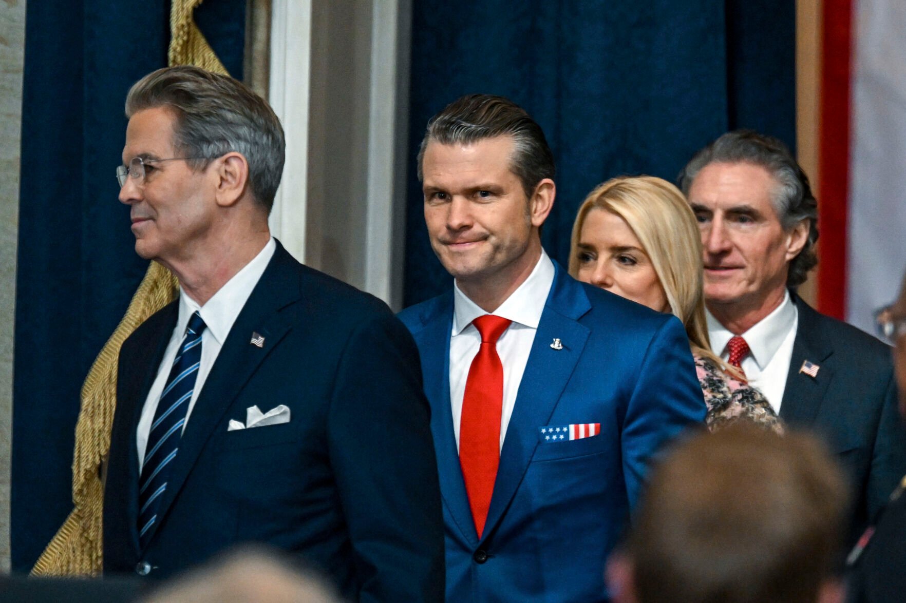 <p>Defense Secretary nominee Pete Hegseth, from second left, Attorney General nominee Pam Bondi and Secretary of the Interior nominee former North Dakota Gov. Doug Burgum, arrive before the 60th Presidential Inauguration in the Rotunda of the U.S. Capitol in Washington, Monday, Jan. 20, 2025. (Kenny Holston/The New York Times via AP, Pool)</p>