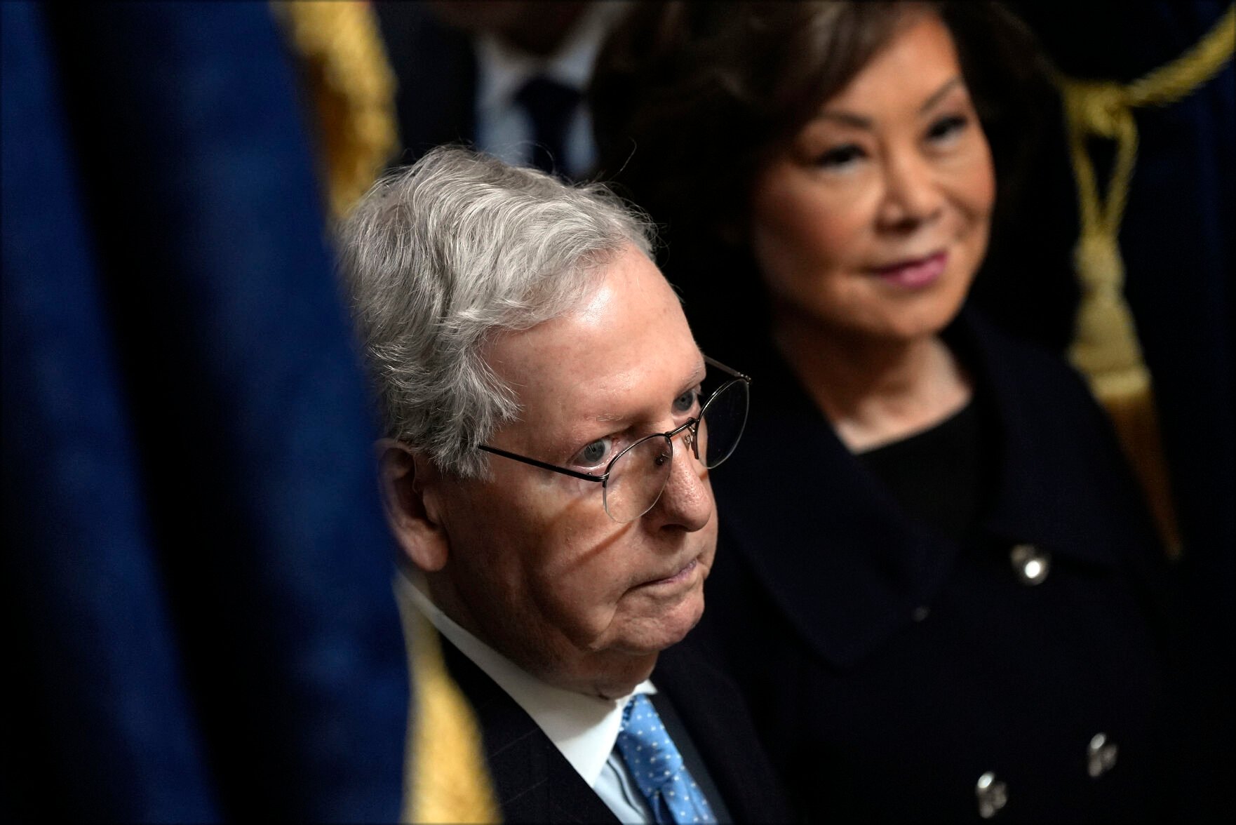 <p>Sen. Mitch McConnell, R-Ky., and Elaine Chao arrive before President Donald Trump's inauguration Monday in the Rotunda of the U.S. Capitol in Washington.</p>