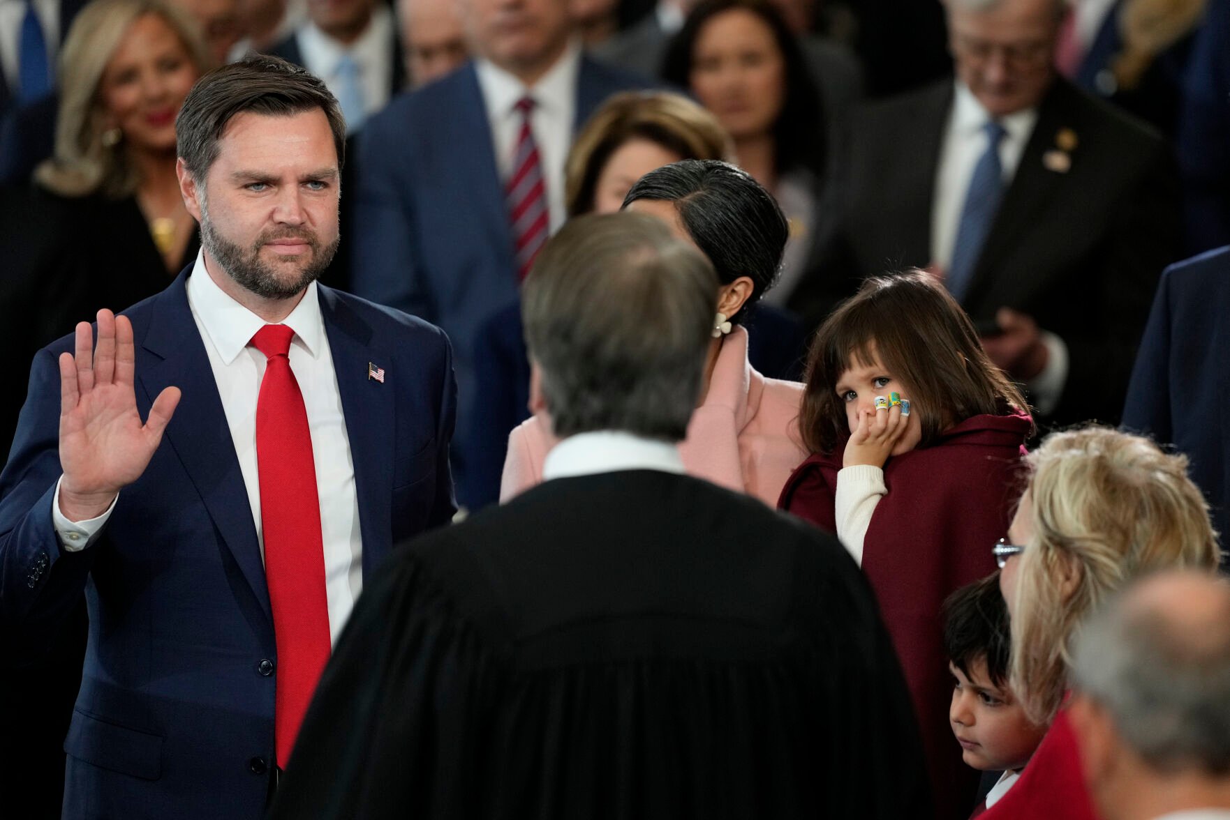 <p>JD Vance is sworn in as vice president by Supreme Court Justice Brett Kavanaugh as Usha Vance holds the Bible during the 60th Presidential Inauguration in the Rotunda of the U.S. Capitol in Washington, Monday, Jan. 20, 2025. (AP Photo/Julia Demaree Nikhinson, Pool)</p>