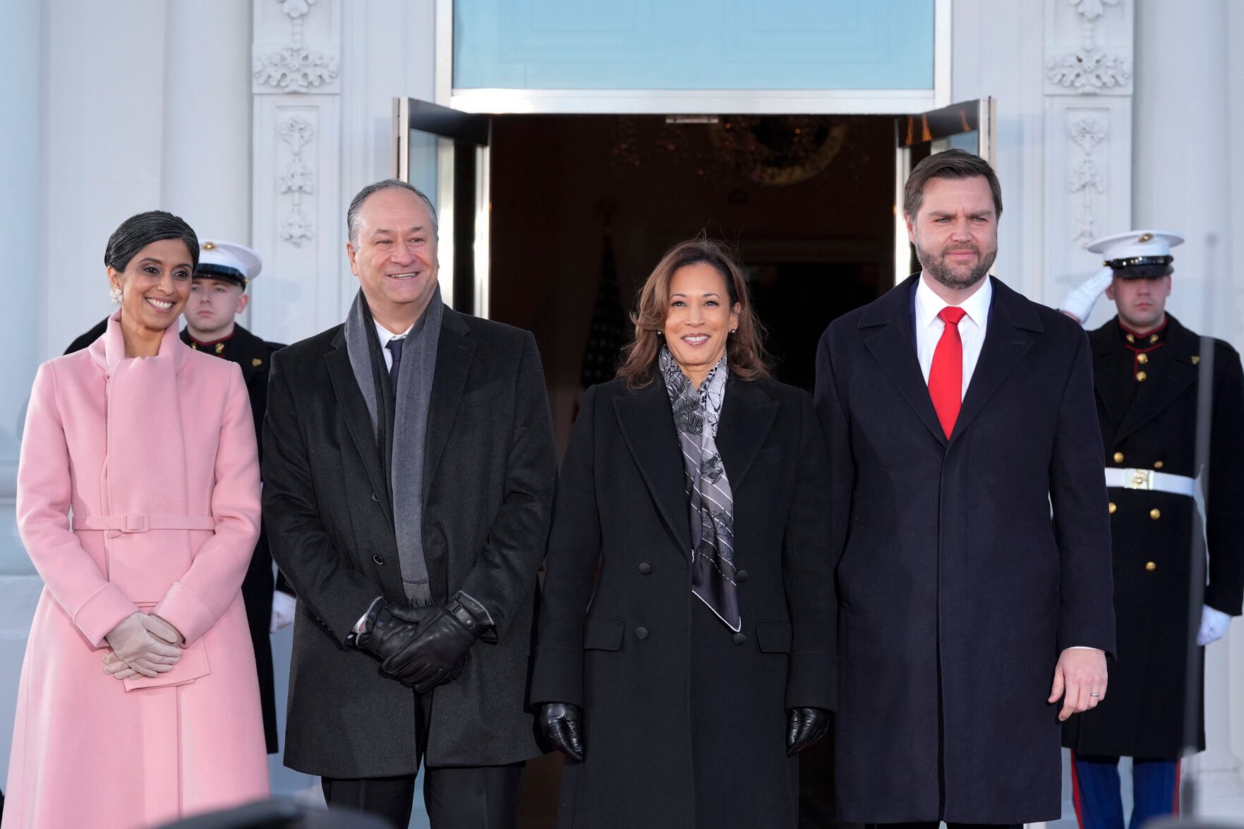<p>Vice President Kamala Harris and second gentleman Doug Emhoff, greet Vice President-elect JD Vance and his wife, Usha Vance upon their arrival at the White House, Monday, Jan. 20, 2025, in Washington. (AP Photo/Alex Brandon)</p>
