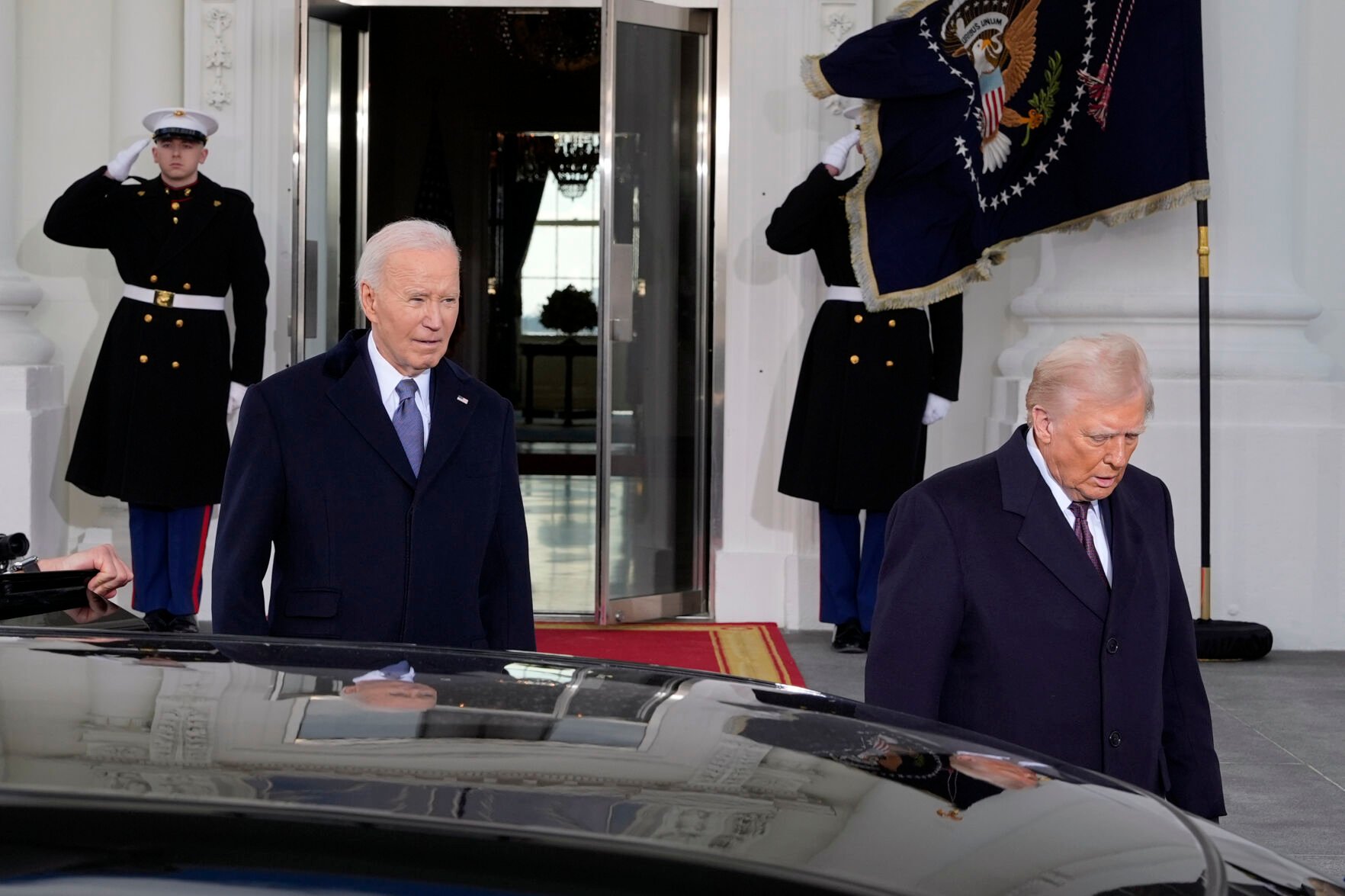 <p>President Joe Biden and President-elect Donald Trump walk out to the presidential limosine, as they depart the White House, Monday, Jan. 20, 2025, in Washington, enroute to the Capitol. (AP Photo/Alex Brandon)</p>