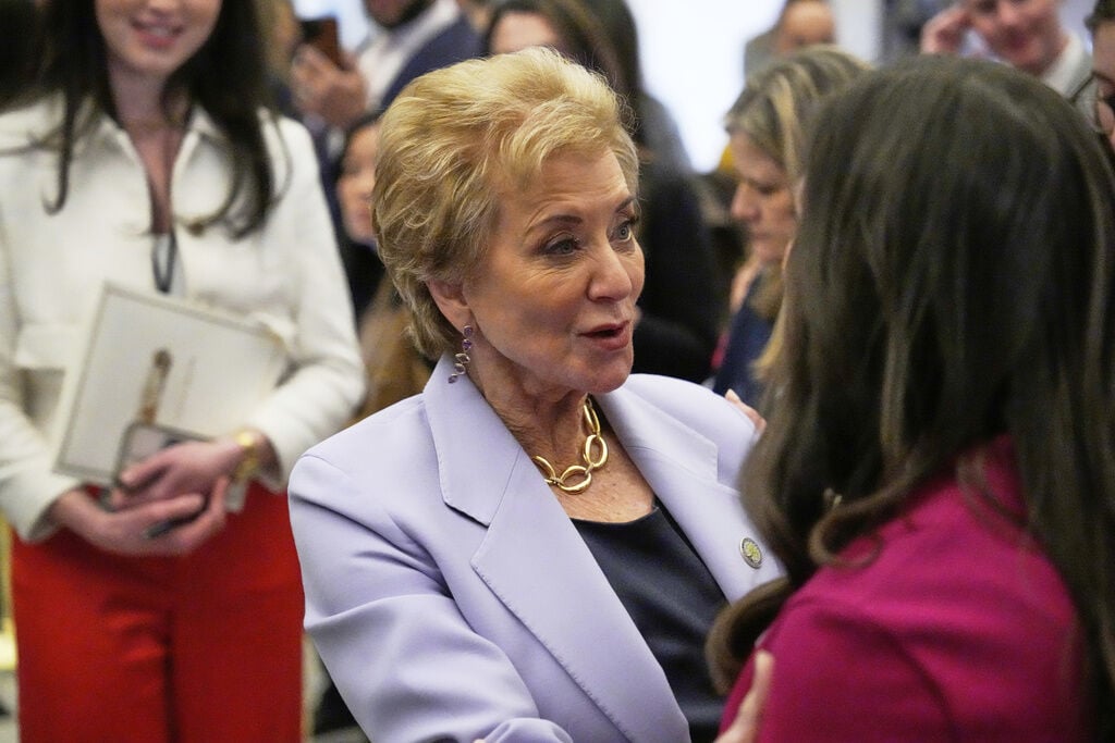<p>Education Secretary Linda McMahon, left, greets Sen. Katie Britt, R-Ala., before President Donald Trump addresses a joint session of Congress at the Capitol in Washington, Tuesday, March 4, 2025. (AP Photo/Ben Curtis)</p>
