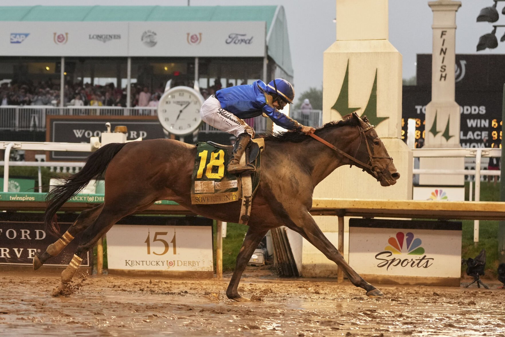 <p>Sovereignty, ridden by Junior Alvarado, crosses the finish line Saturday to win the 151st running of the Kentucky Derby at Churchill Downs in Louisville, Ky.</p>
