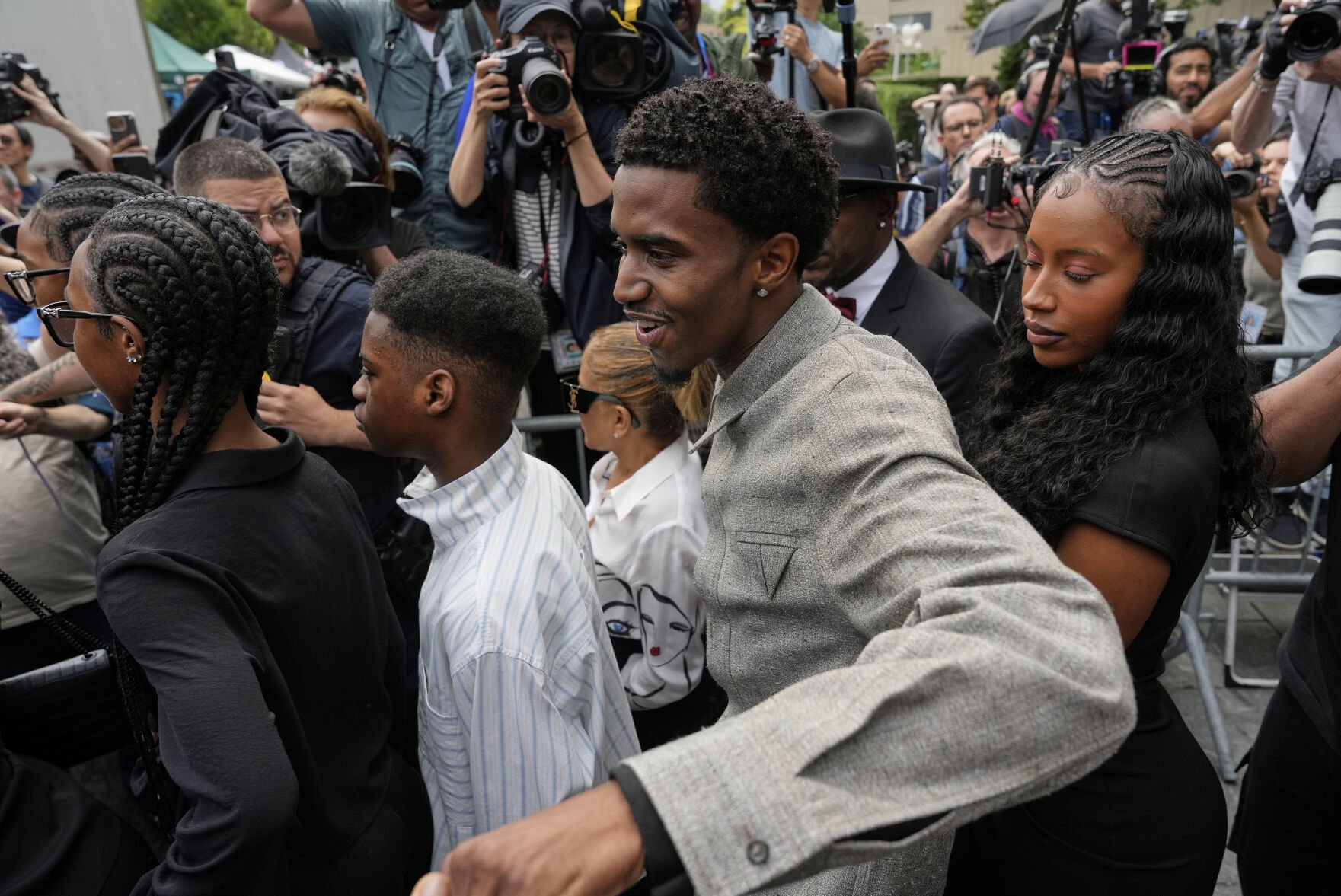 <p>Family members of Sean "Diddy" Combs, react as they leave Manhattan federal court after Combs' was convicted of a prostitution-related offense but acquitted on the most serious charges at his New York trial, July 2, in New York.</p>