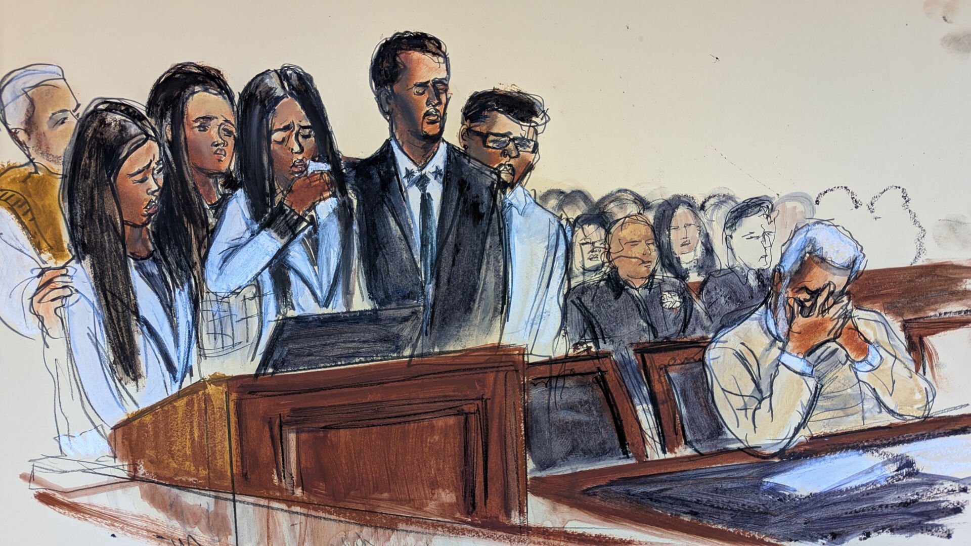 <p>In this courtroom sketch, D'Lila Combs, left center, makes a statement surrounded by family as Sean Diddy Combs, right, reacts during his sentencing hearing in Manhattan federal court, Friday, Oct. 3, 2025, in New York. (Elizabeth Williams via AP)</p>