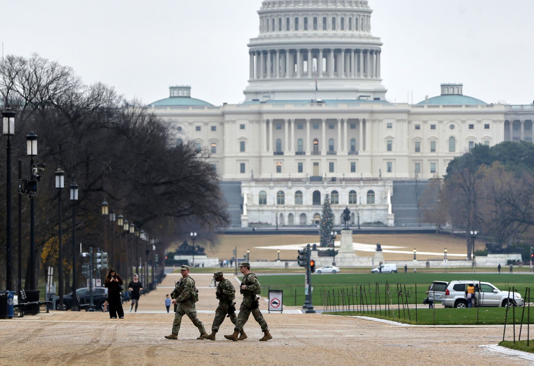 <p>National Guard patrol Wednesday on the National Mall near the U.S. Capitol in Washington. </p>