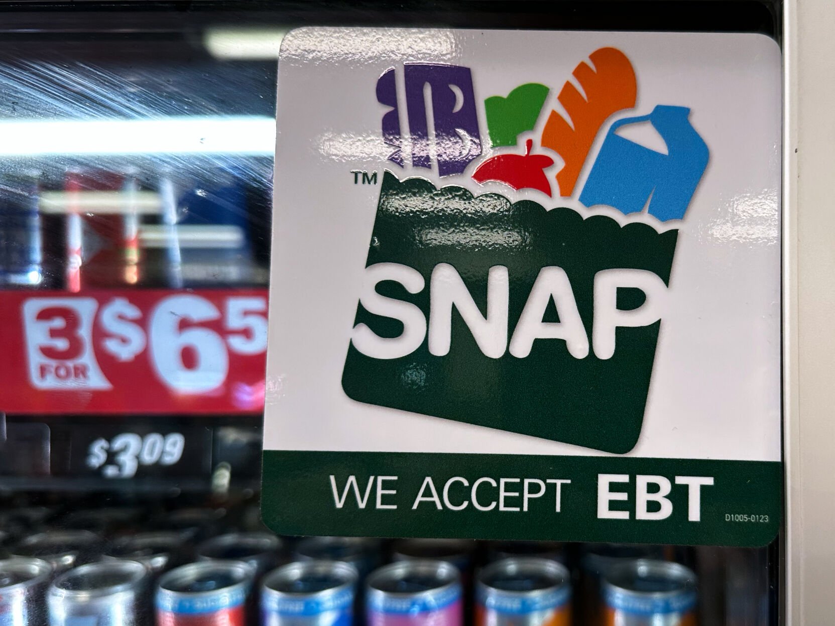 <p>SNAP EBT information sign is displayed Nov. 1 at a gas station in Riverwoods, Ill.</p>