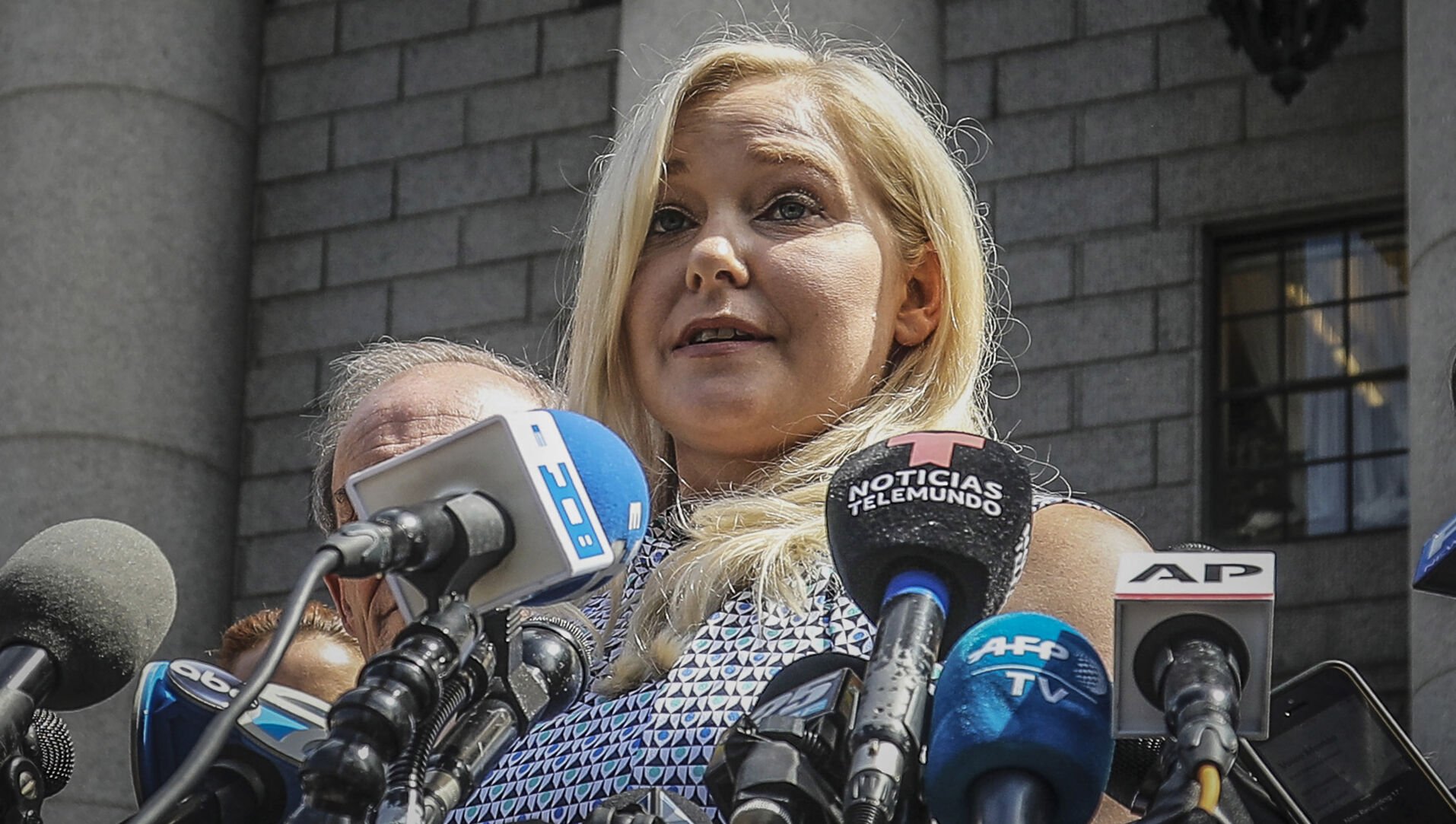 <p>FILE - Virginia Roberts Giuffre holds a news conference outside a Manhattan court following the jailhouse death of Jeffrey Epstein, Aug. 27, 2019, in New York. Lawyers for Prince Andrew and Giuffre, who accused him of sexually abusing her when she was 17, formally asked a judge Tuesday to dismiss her lawsuit.(AP Photo/Bebeto Matthews, File)</p>