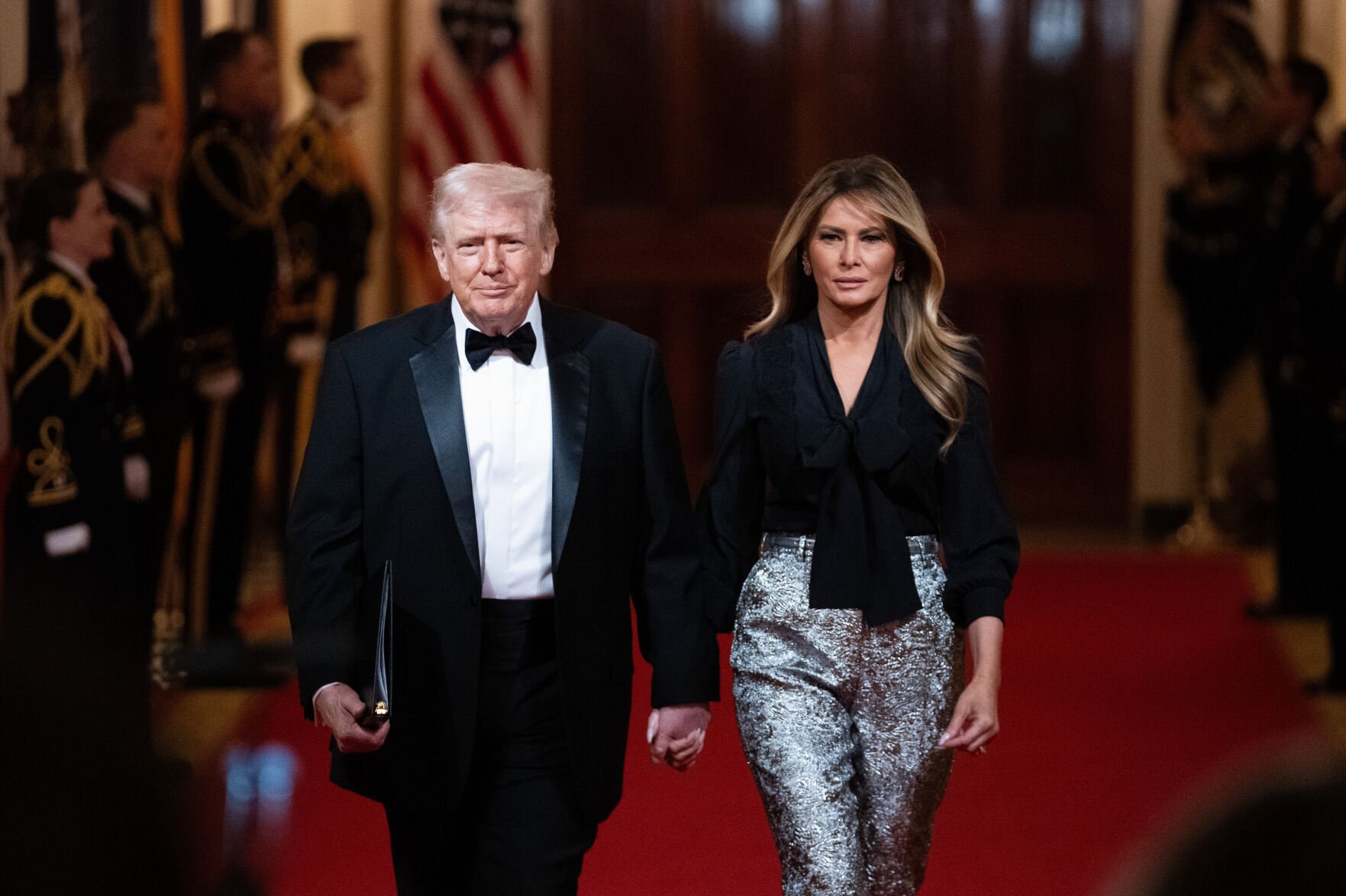 <p>President Donald Trump and first lady Melania Trump arrive at the National Governors Association dinner at the White House on Saturday in Washington. </p>