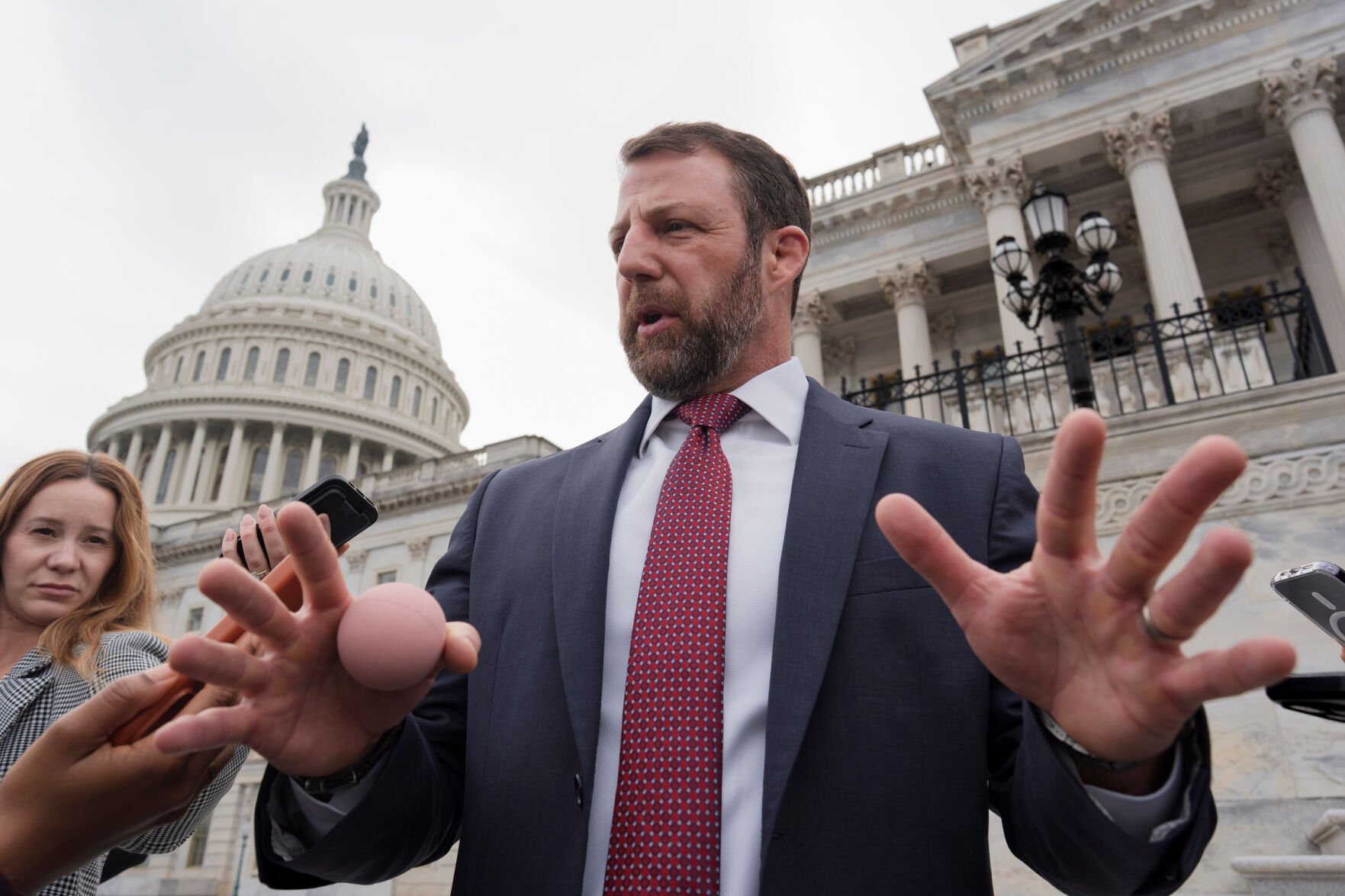 <p>Sen. Markwayne Mullin, R-Okla., speaks with reporters on the steps at the Capitol in Washington, Thursday, March 5, 2026. (AP Photo/J. Scott Applewhite)</p>