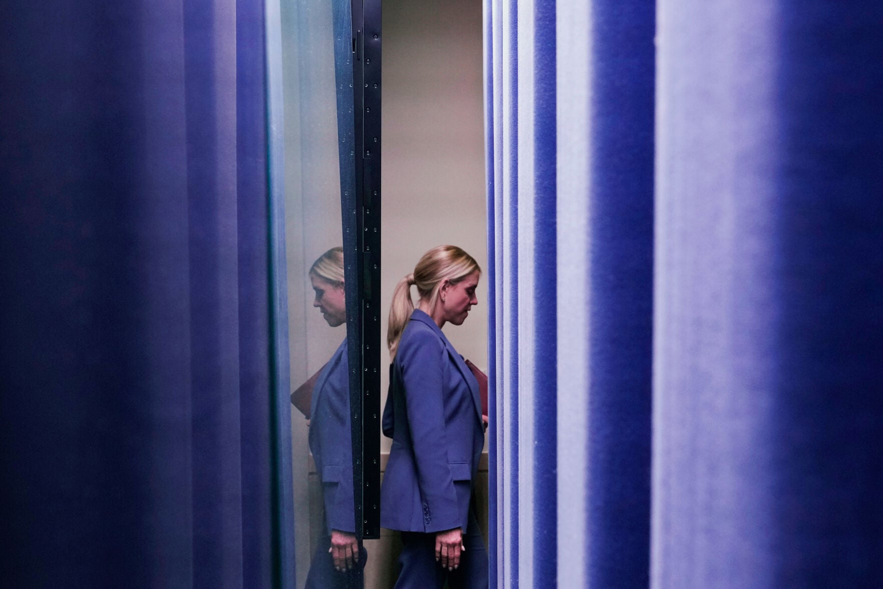 <p>Attorney General Pam Bondi is shown leaving after the end of President Donald Trump's remarks to reporters in the James Brady Press Briefing Room at the White House, Feb. 20, in Washington.</p>
