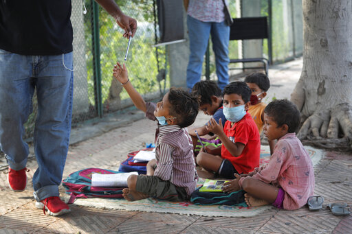 Indian Couple Run Street Side Classes For Poor Students