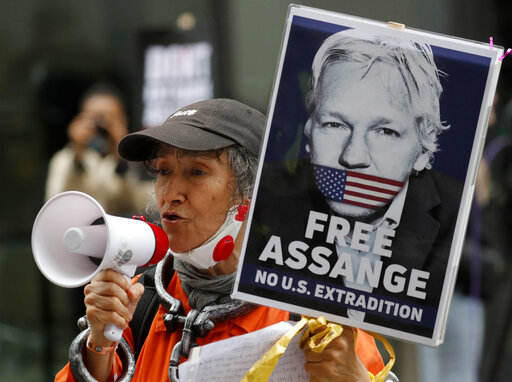 Assange Extradition Hearing Paused Over Covid 19 Risk