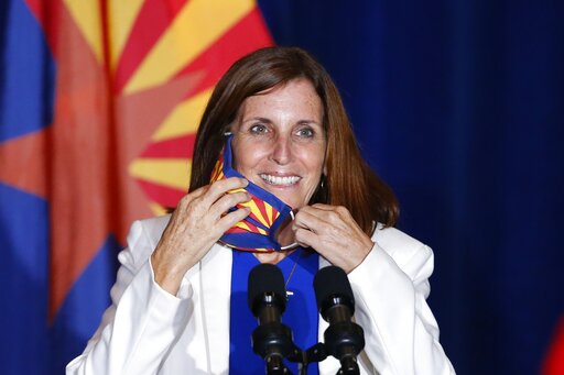 Ap Fact Check: Gop Ads Twist Deal For Ariz. Dem’s Ex Company