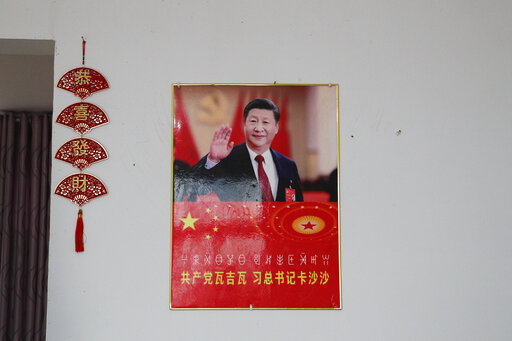 Ap Photos: Xi’s Portrait Adorns New Homes For China’s Poor
