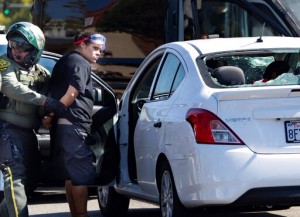 Woman Arrested After Driving Car Into California Protest