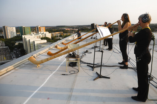 Rooftop Alphorns Power Virus Safe Concert In Germany