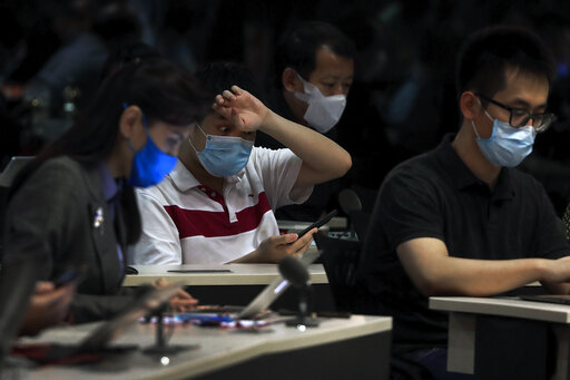 Australia Minister Warns Foreign Journalists Amid China Spat