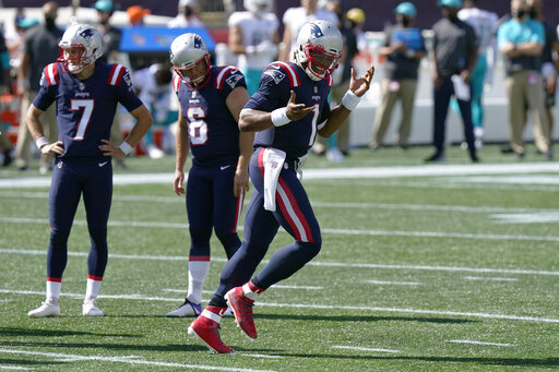 Newton Runs For 2 Tds, Patriots Hold Off Dolphins 21 11