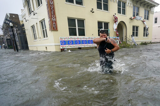 Ap Photo Gallery: Sally’s Deluge Swamps Streets, Ruins Cars