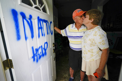 ‘in Attic Help’: Couple Is Rescued From Storm Sally By Water