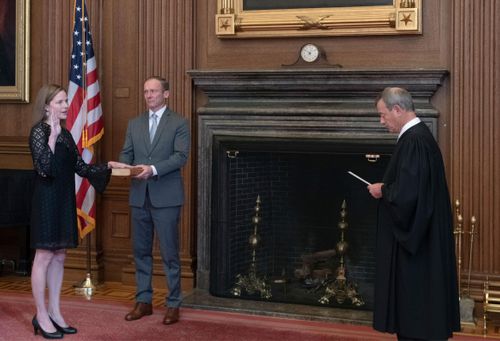 Associate Justice Amy Coney Barrett Sworn In By Chief Justice Roberts
