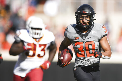 Sanders, Hubbard Lead No. 6 Oklahoma St. Past Iowa St. 24 21