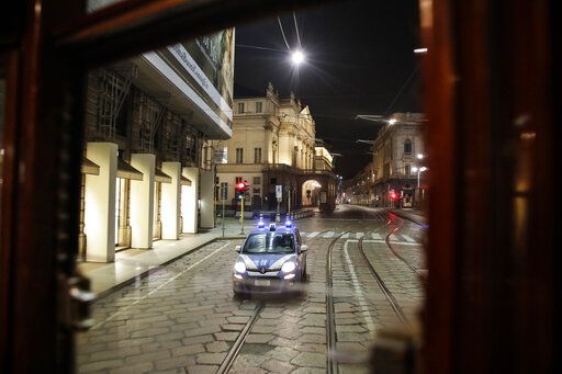 Ap Photos: New Virus Curfew Brings Silence To Milan Streets